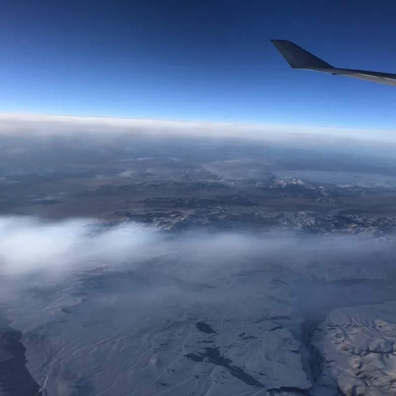 Flying over a snowy landscape