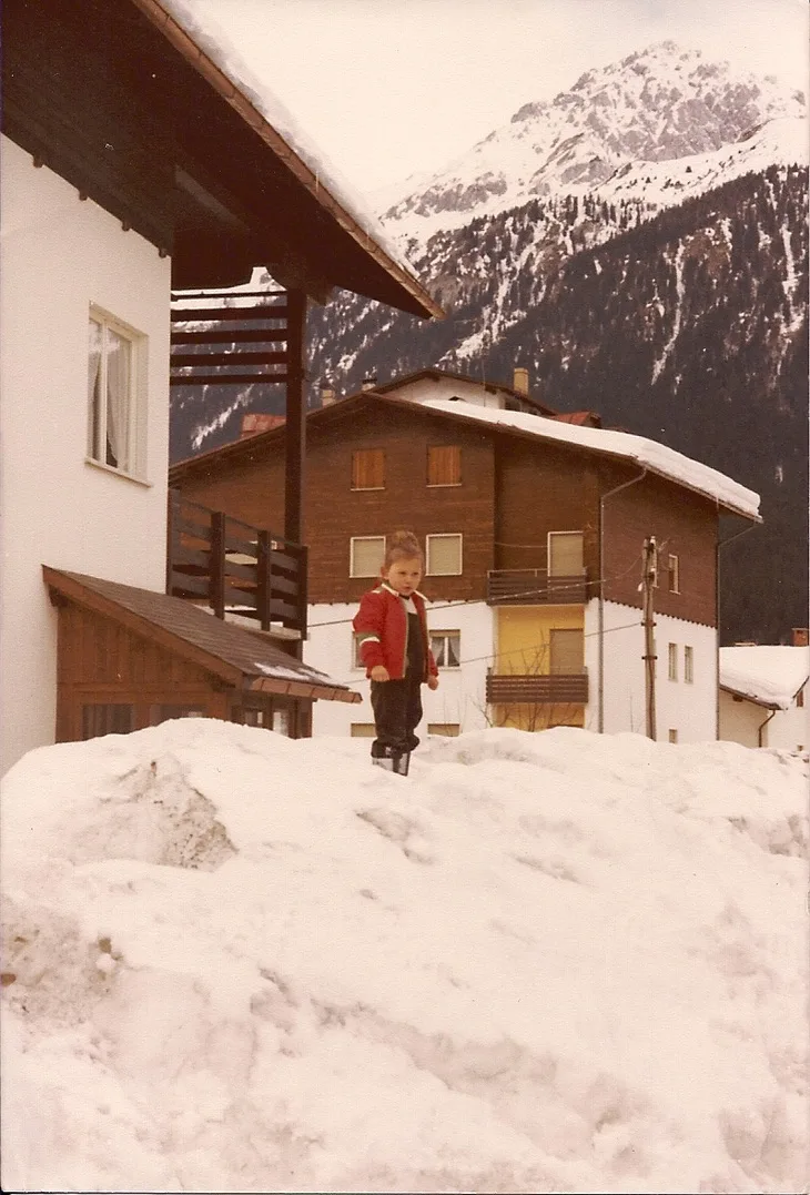 Silvia as a small child in the snow-covered Alps